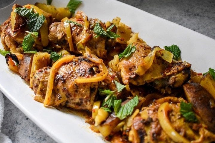 https://hips.hearstapps.com/hmg-prod/images/slow-cooker-chicken-recipes-slow-cooker-moroccan-chicken-65735e4fce011.jpeg?crop=0.668xw:1.00xh;0.155xw,0&resize=980:*