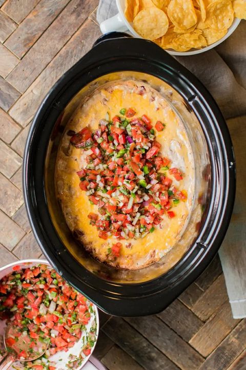 slow cooker creamy ranch bean dip with salsa and chips