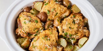 behind cooker garlic parmesan chicken with sleek herbs and potatoes