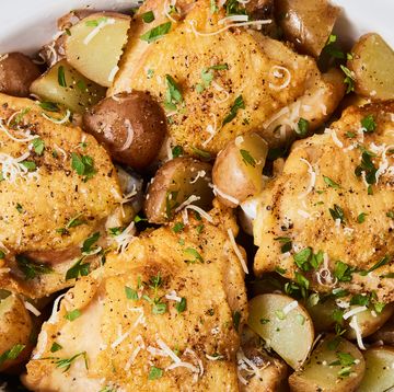 slow cooker garlic parmesan chicken with fresh herbs and potatoes