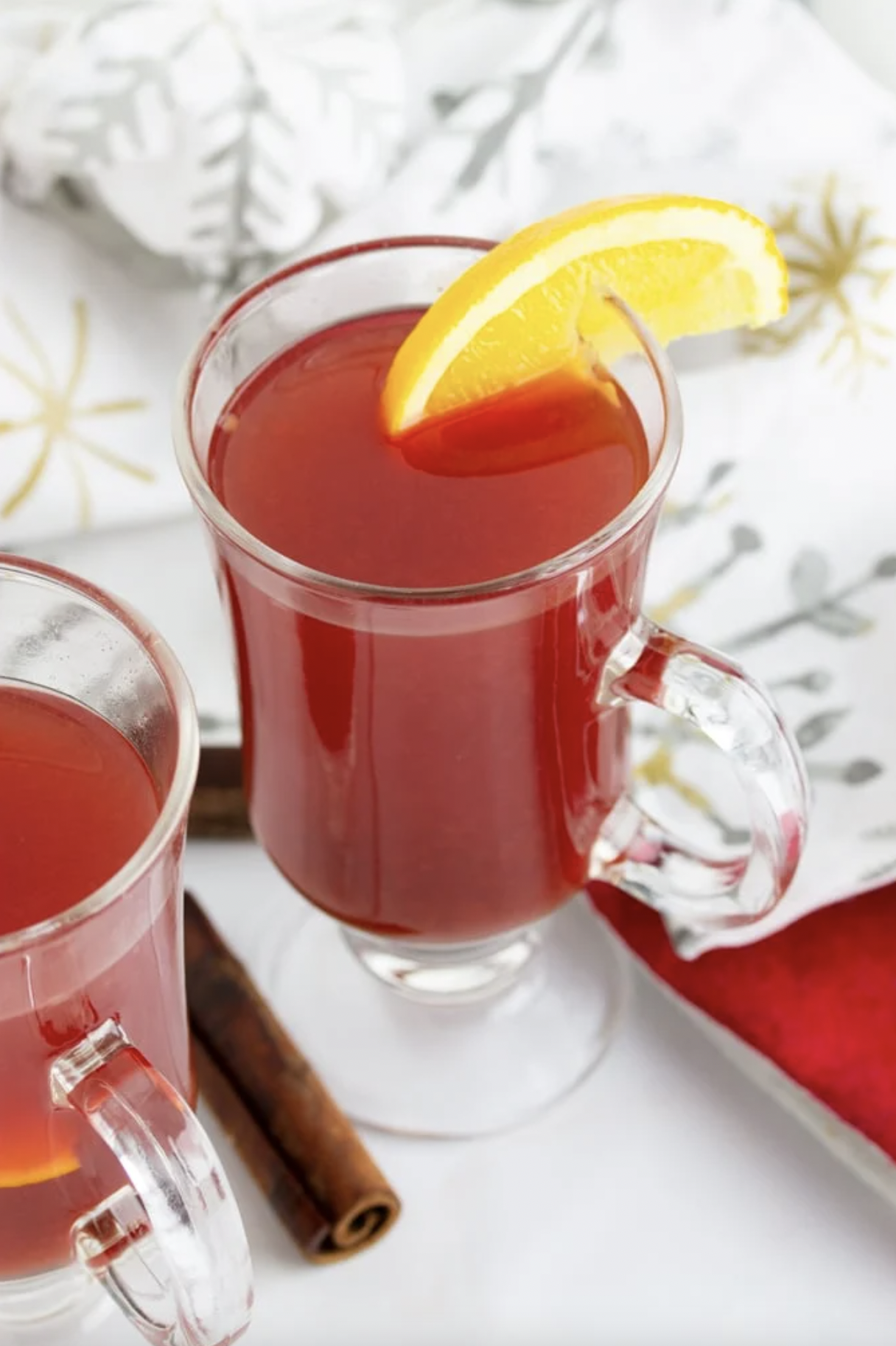 https://hips.hearstapps.com/hmg-prod/images/slow-cooker-holiday-punch-658afad99cd1b.png