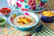 slow cooker potato soup recipe with slow cooker in the background