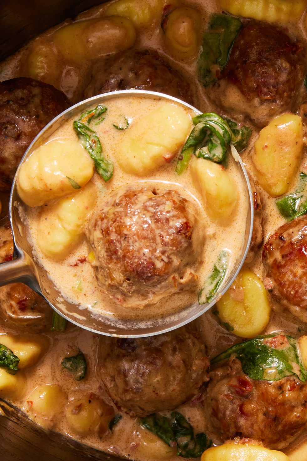 chicken meatballs and gnocchi in a creamy tuscan sauce