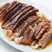 sliced slow cooked brisket and onions