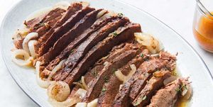 sliced slow cooked brisket and onions