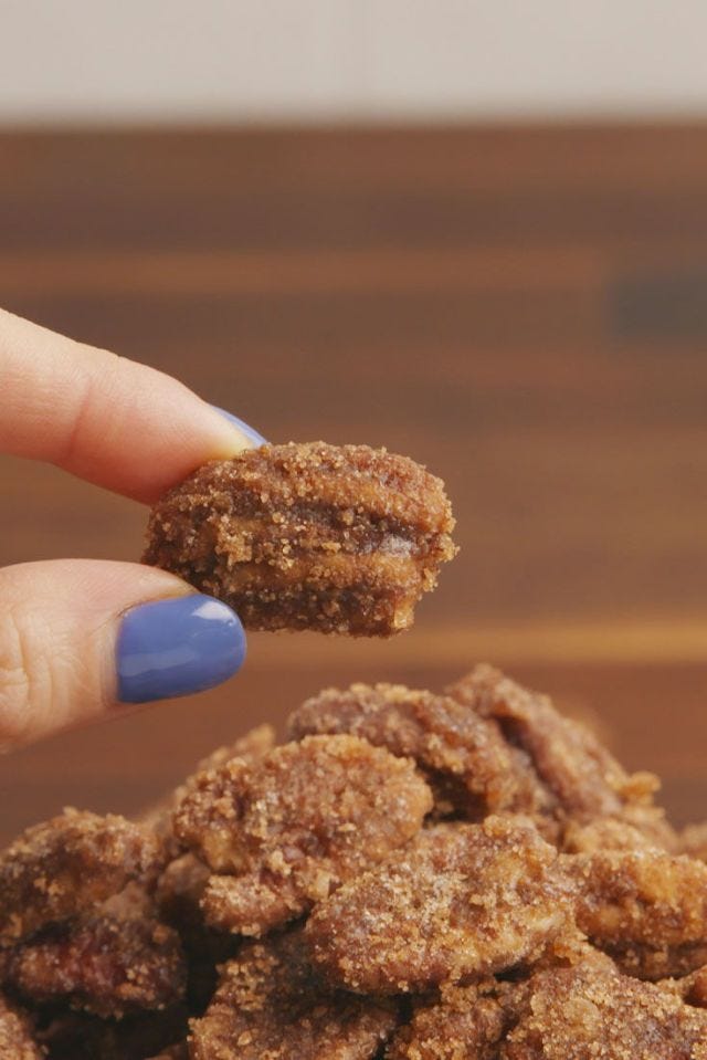 closeup of one slow cooker candied pecan