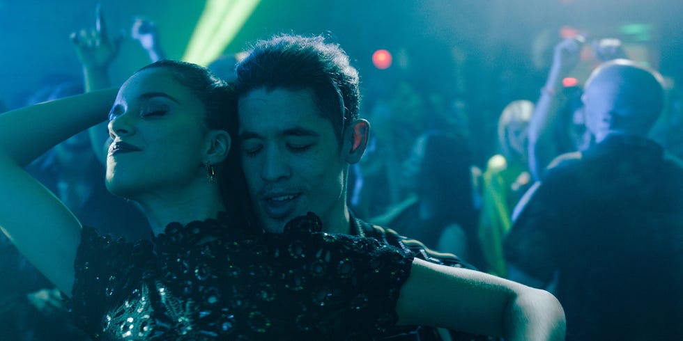 social gathering at a party or club scene with people dancing