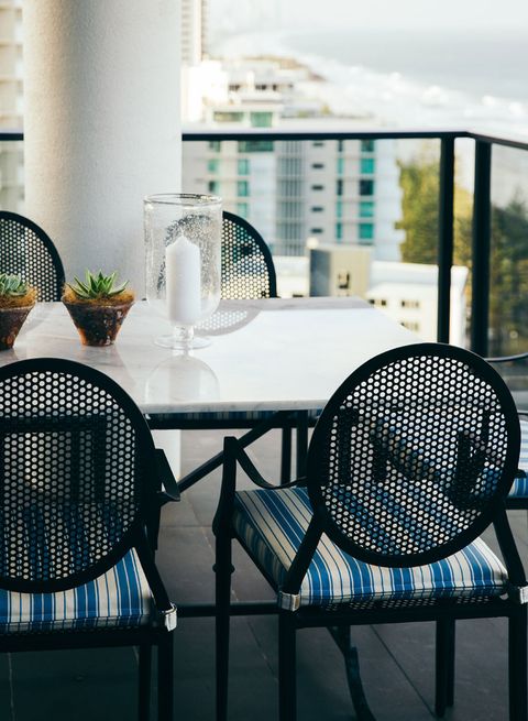 small balcony with blue chair