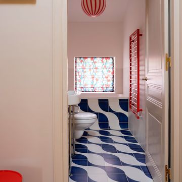 small bathroom with blue floor tiles