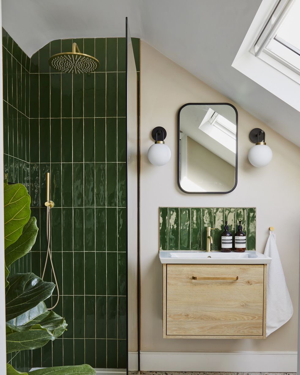 https://hips.hearstapps.com/hmg-prod/images/small-bathroom-ideas-green-tiles-sloped-ceiling-lily-bell-house-photographer-brent-darby-64c2576ae4391.jpeg?crop=1.00xw:0.834xh;0,0.0636xh&resize=980:*