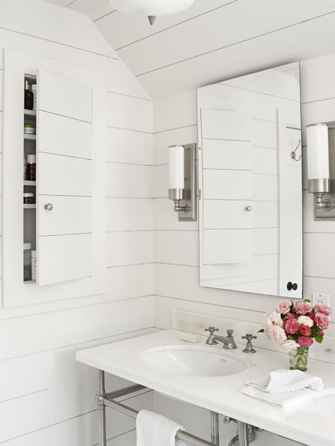 white bathroom with built in storage