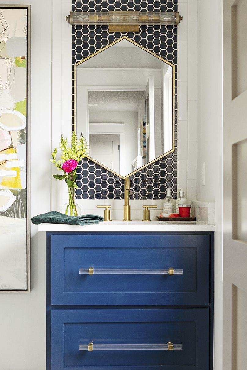bathroom storage ideas, blue vanity with hexagon mirror