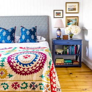 small bohemian bedroom with white walls