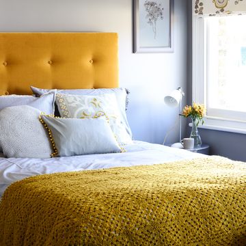 large bedstead and headboard creates a stunning feature in a small bedroom