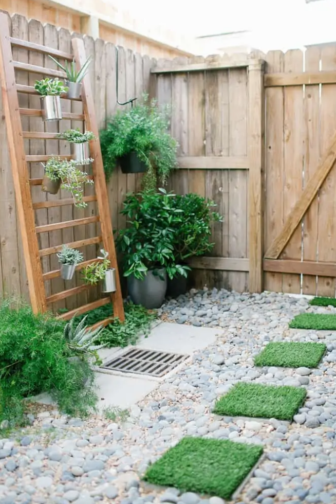 Small garden ideas, artificial grass stepping stones