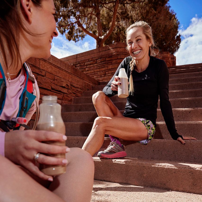 women drink chocolate milk after exercise