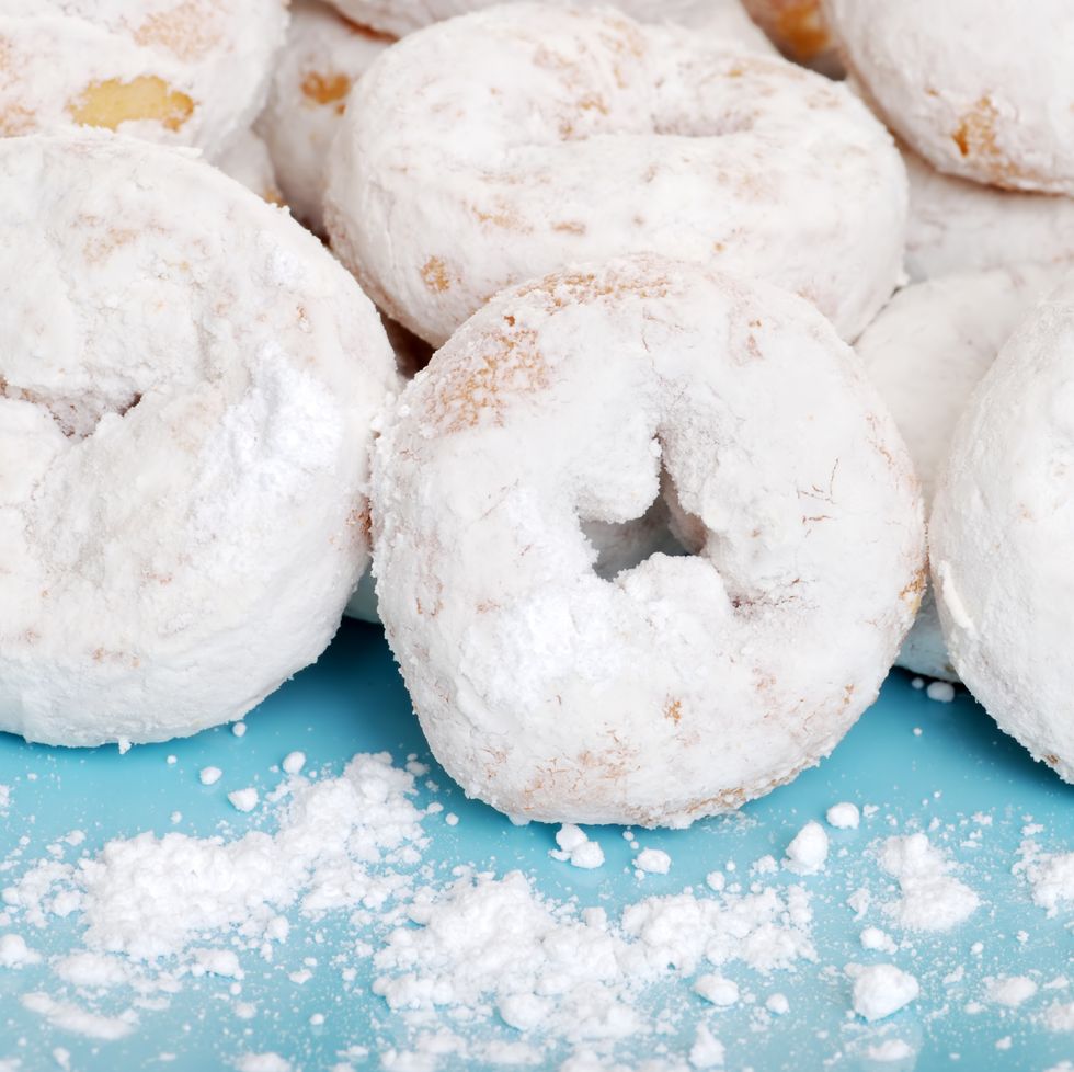 small icing sugar covered donuts