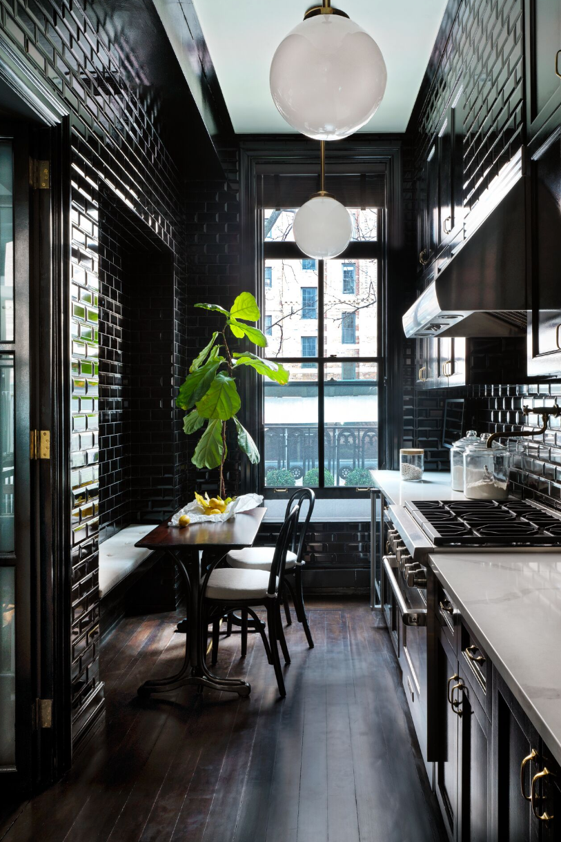 black kitchen with breakfast nook