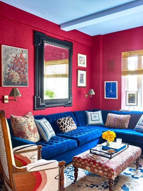 small living room with red walls