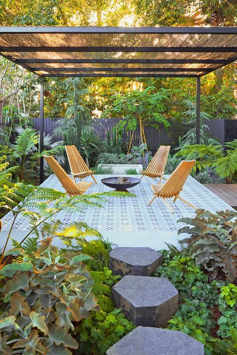 small patio surrounded by greenery