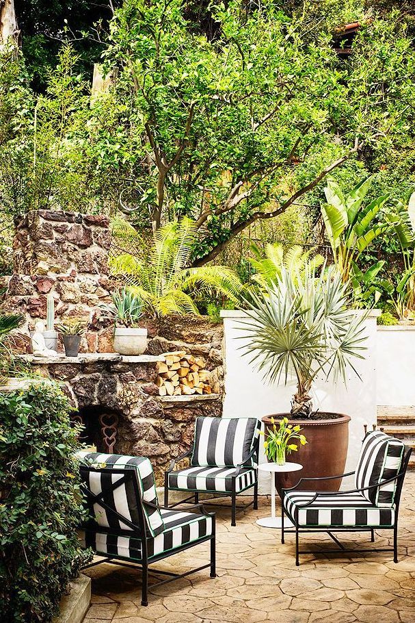 small patio with fireplace