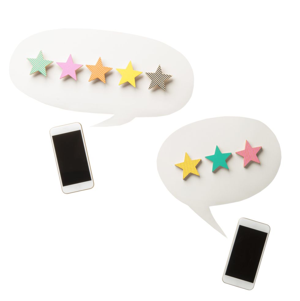 smartphones with chat bubbles that contain stars