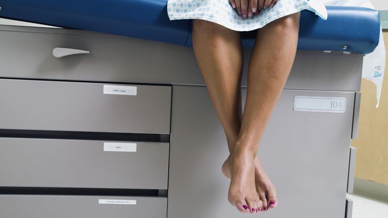 woman waiting for smear test in hospital