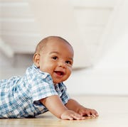 Smiling Baby Crawling Across the Floor smiling baby crawling across the floor