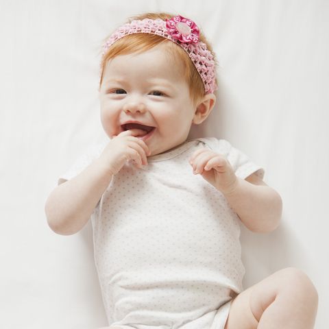 smiling caucasian baby girl