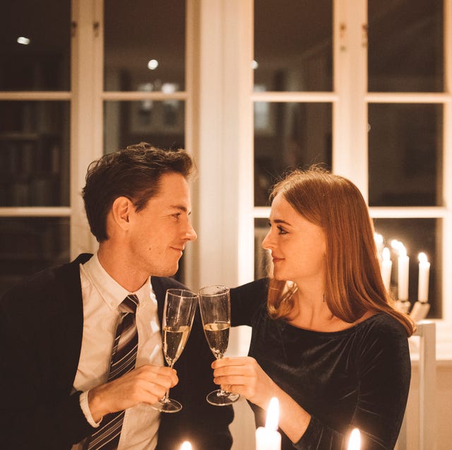 smiling couple having dinner together