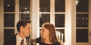 smiling couple having dinner together