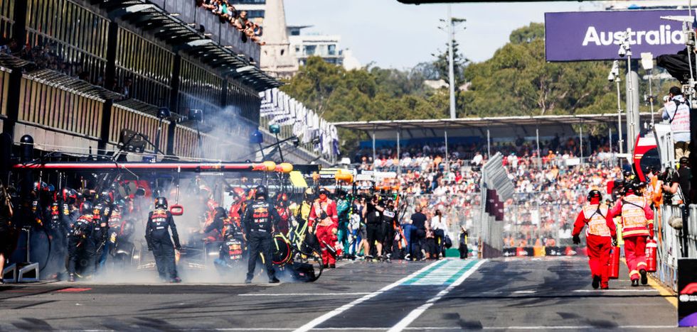 smoke is seen billowing from the car of max verstappen of