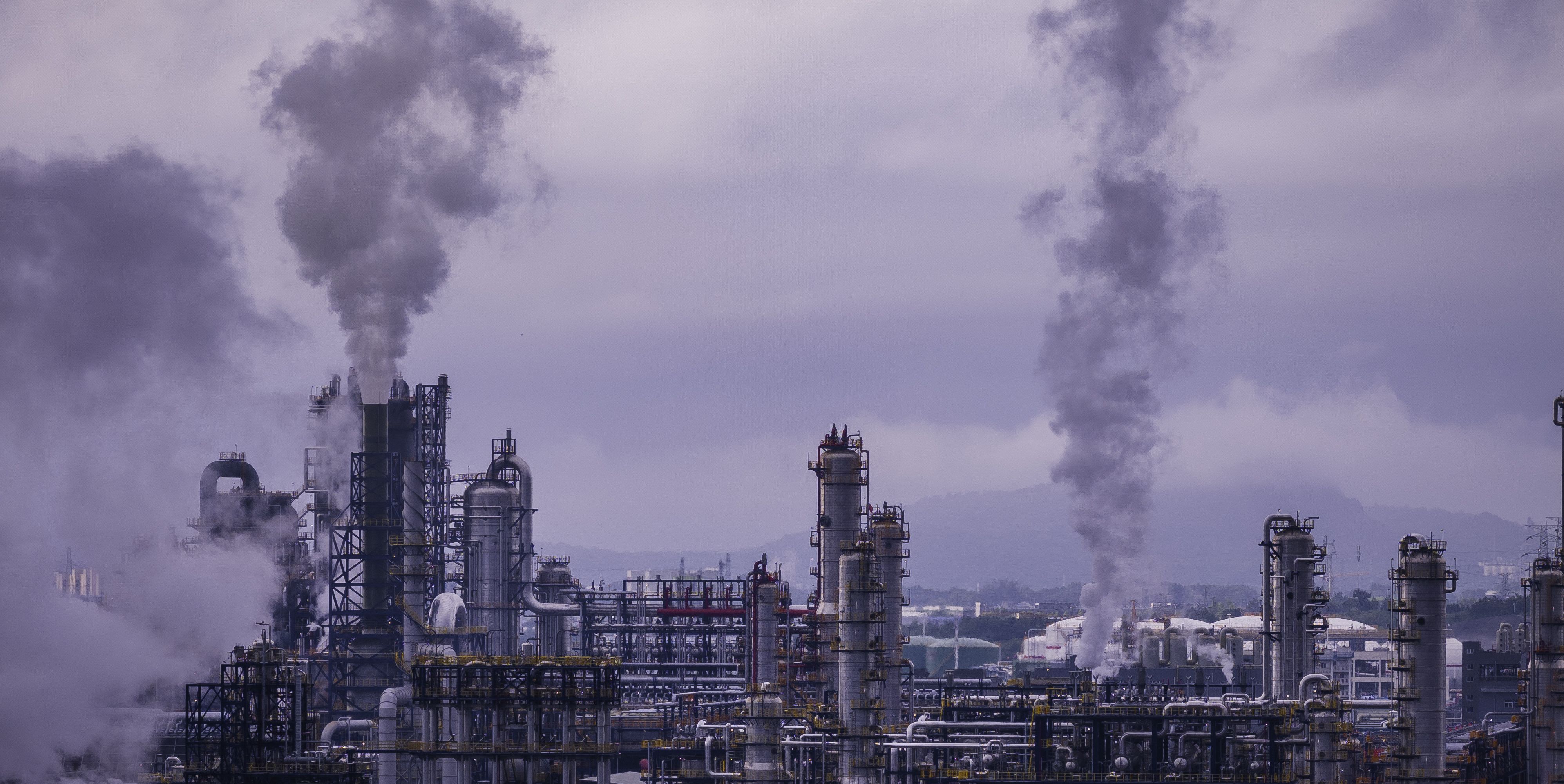 smoke-stacks-at-a-chemical-plant-royalty-free-image-1743185905.pjpeg