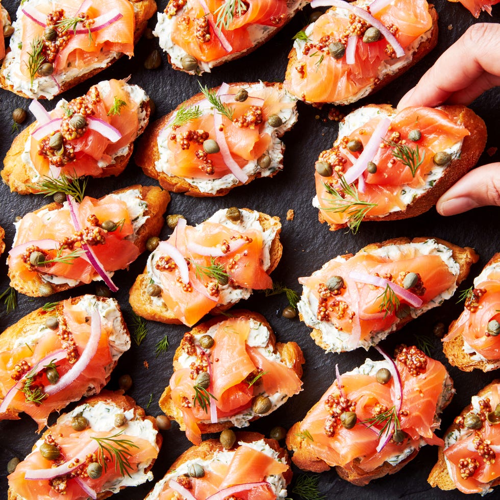 crostini topped with cream cheese, smoked salmon, red onion and capers