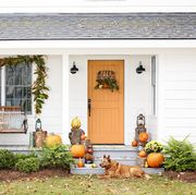 colorful fall porch and orange door
