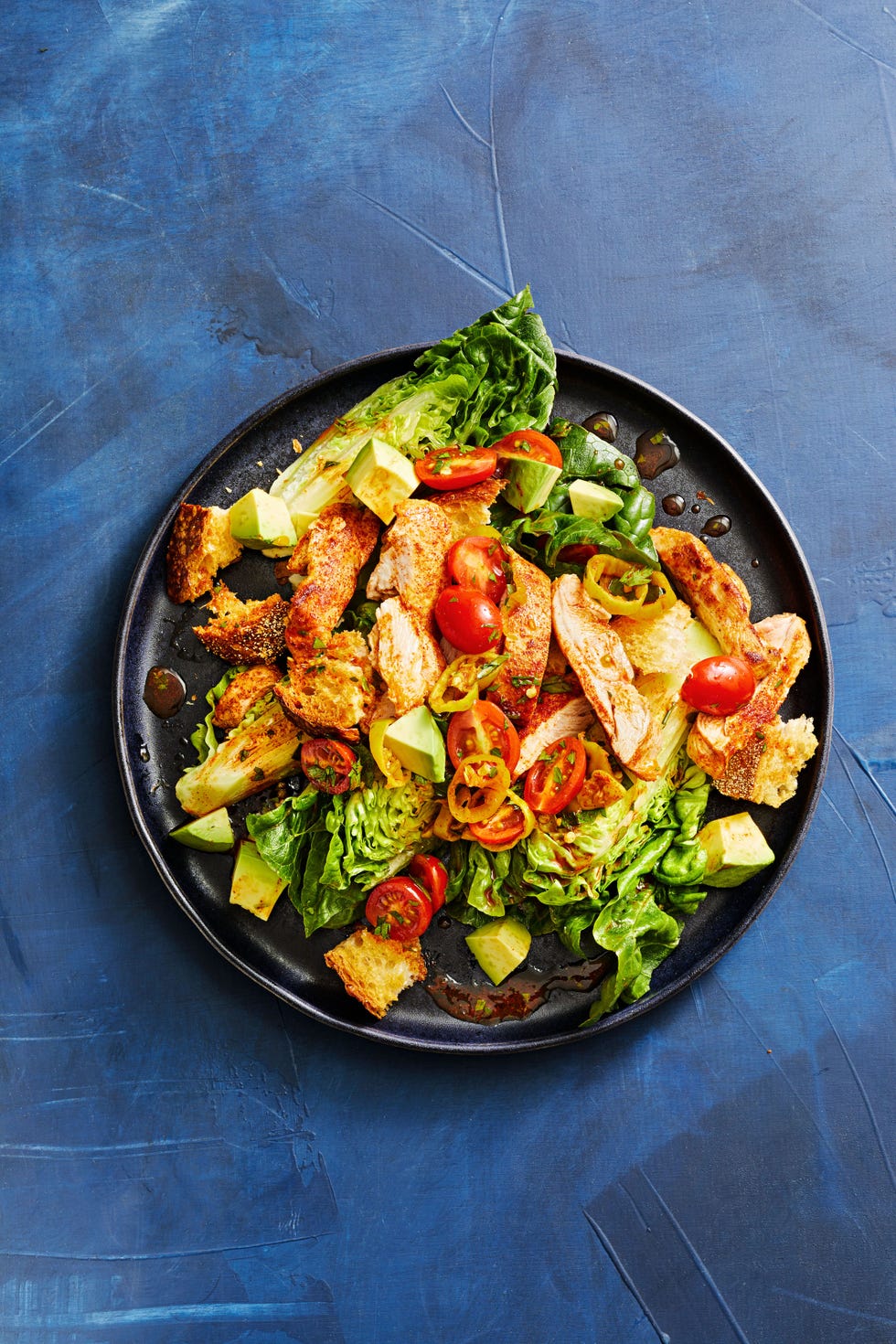 smoky chicken thighs on baby romaine
