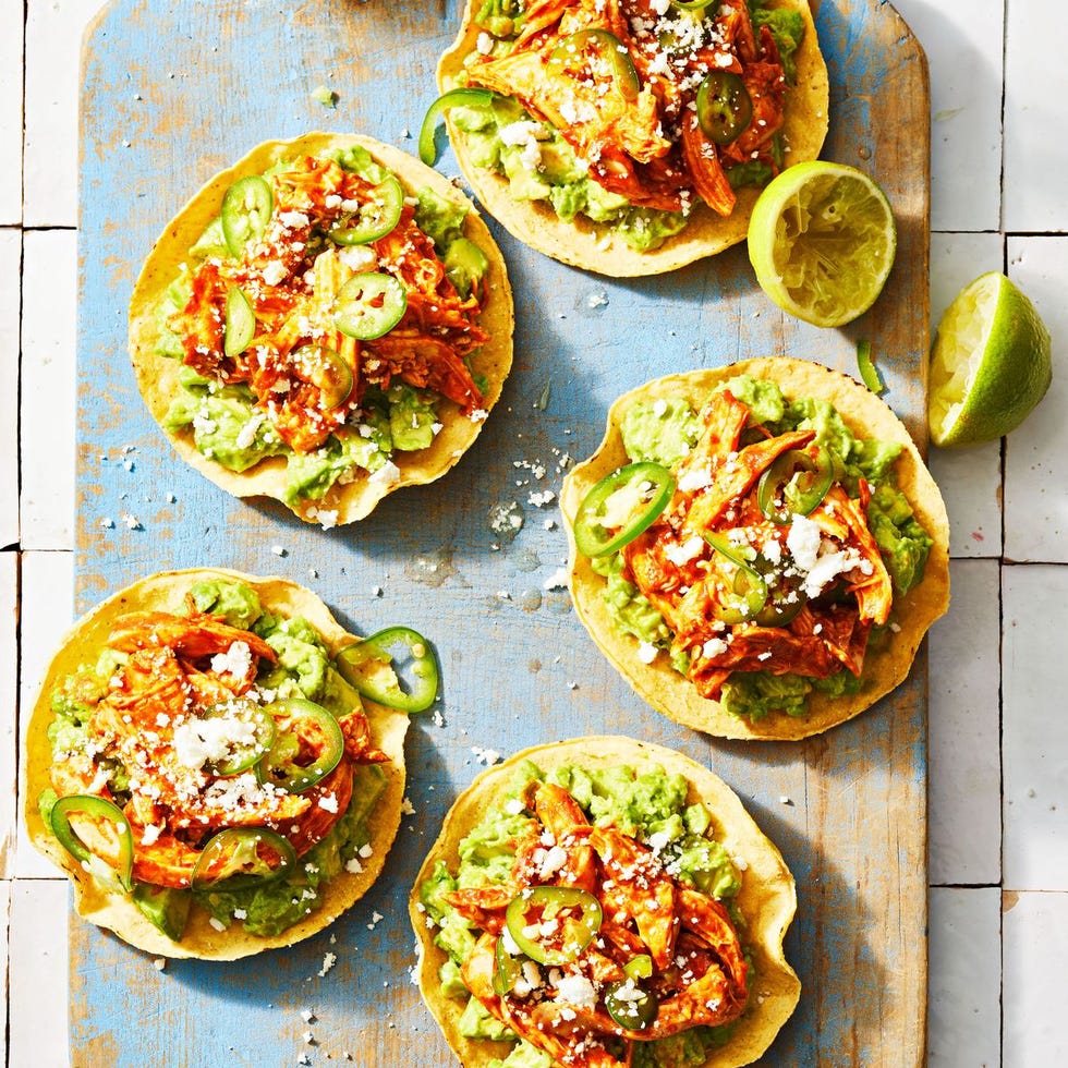 chicken tostadas with avocado, jalapeño, a cheese