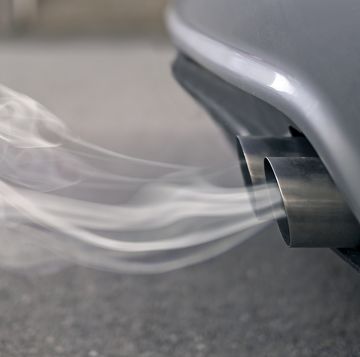 smoky exhaust pipes from a starting diesel car