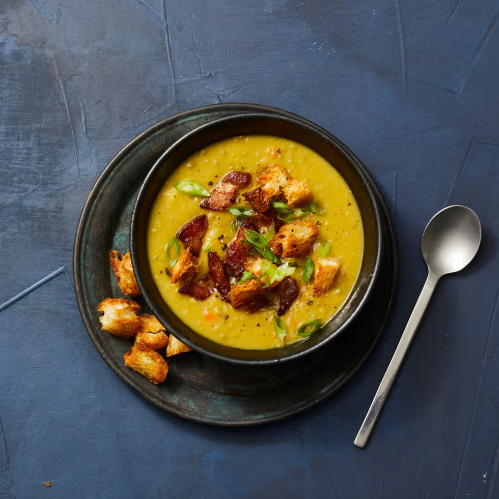 smoky split pea soup topped with bacon and croutons
