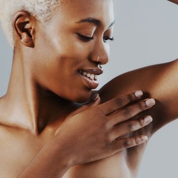ingrown hair treatment black woman looking at smooth underarms