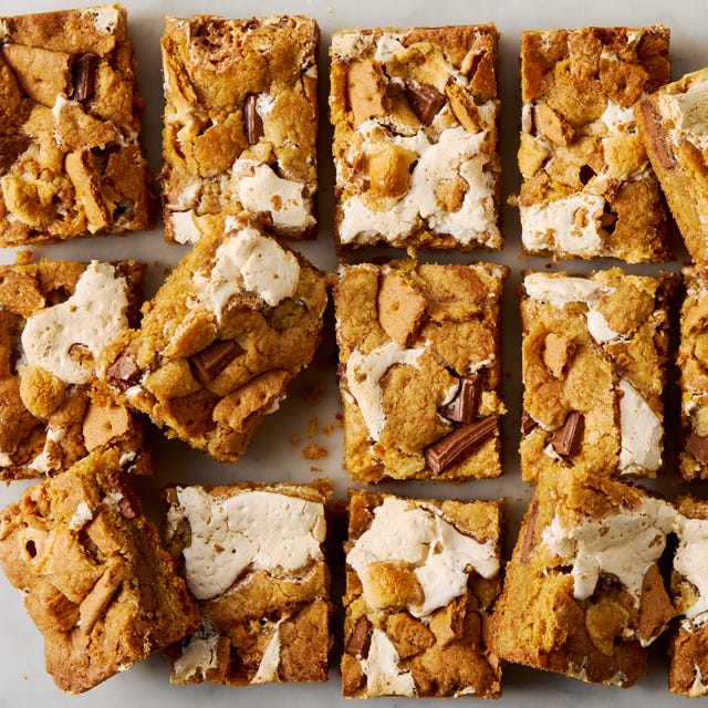 cookie bars filled with s'mores ingredients like chocolate, marshmallow, and graham crackers