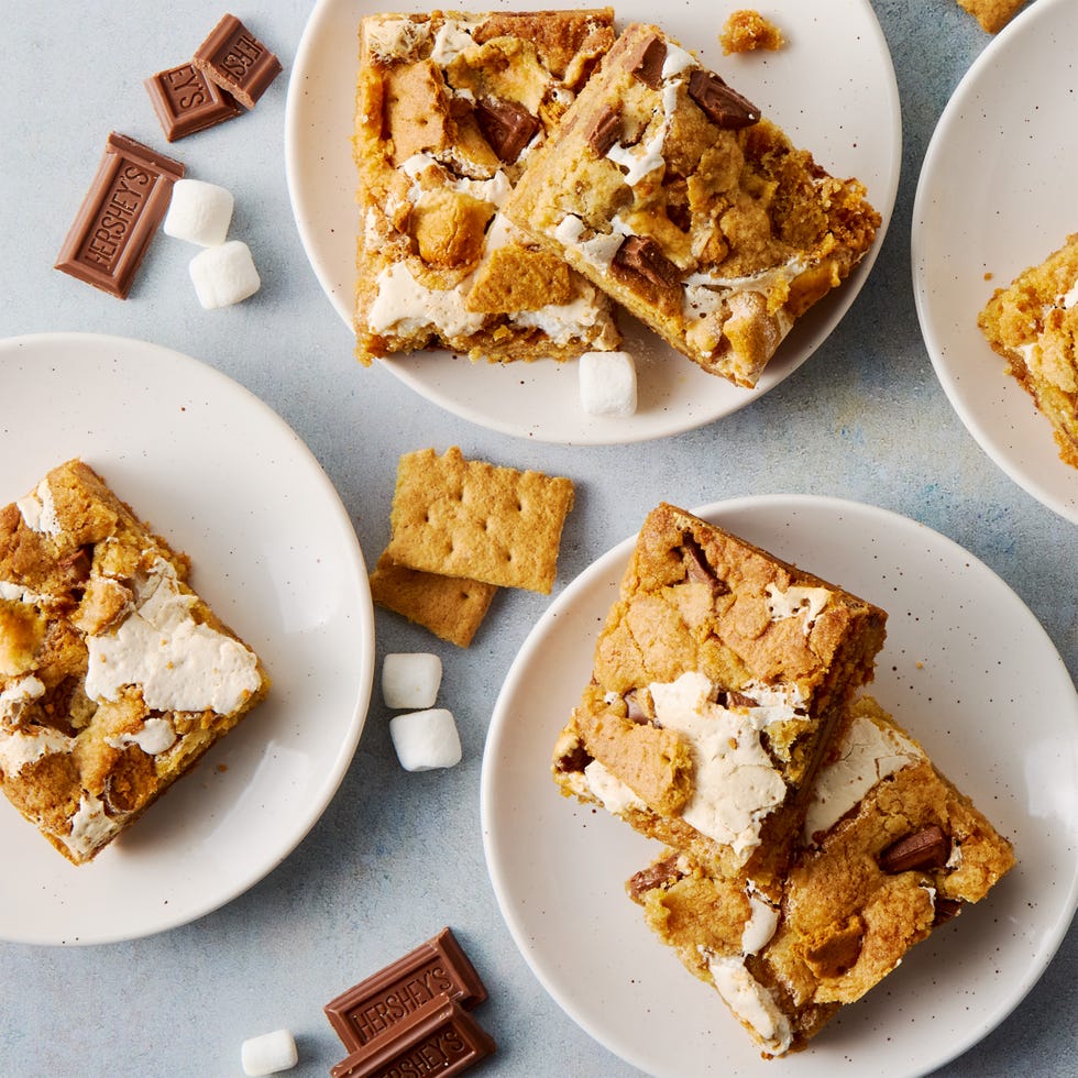 cookie bars filled with s'mores ingredients like chocolate, marshmallow, and graham crackers