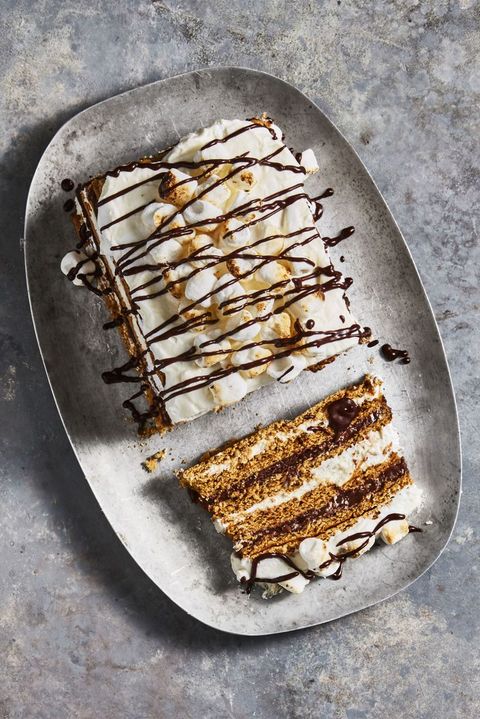 s'mores icebox cake with chocolate drizzled on top
