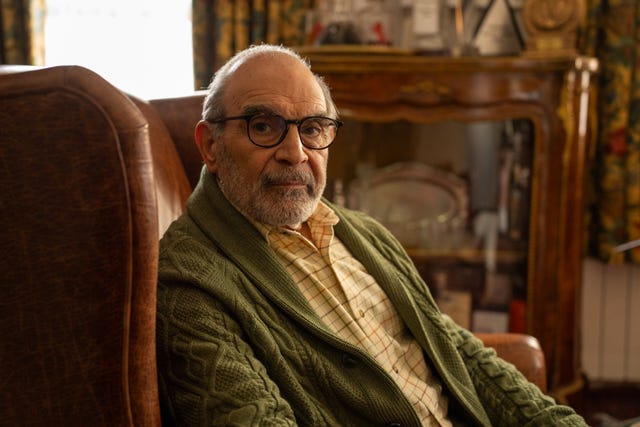 george (david suchet) watches tv