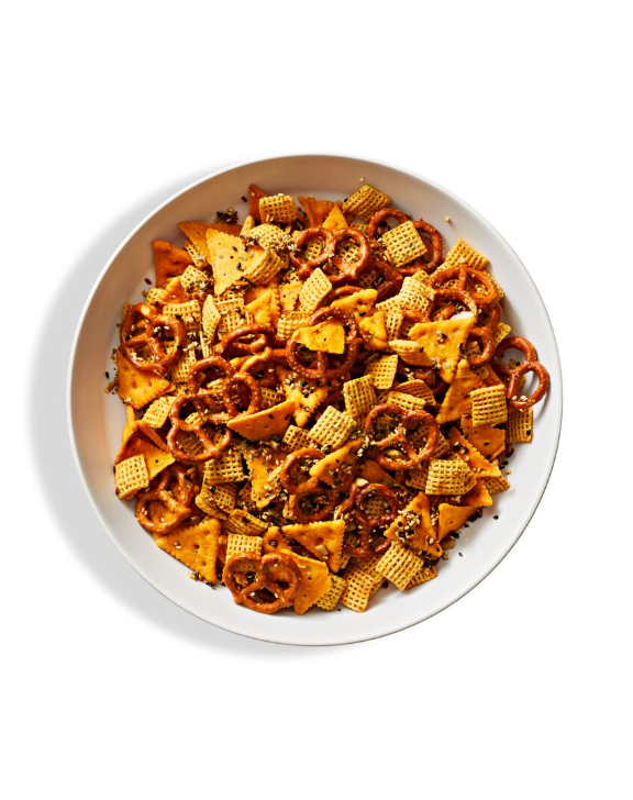 spiced snack mix in a white bowl