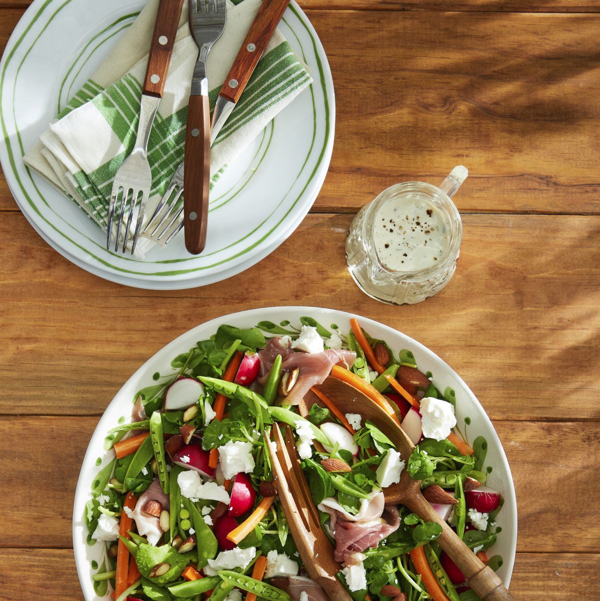 https://hips.hearstapps.com/hmg-prod/images/snap-pea-salad-with-feta-almonds-and-prosciutto-1677084752.jpg?crop=1.00xw:0.668xh;0,0.207xh&resize=1200:*