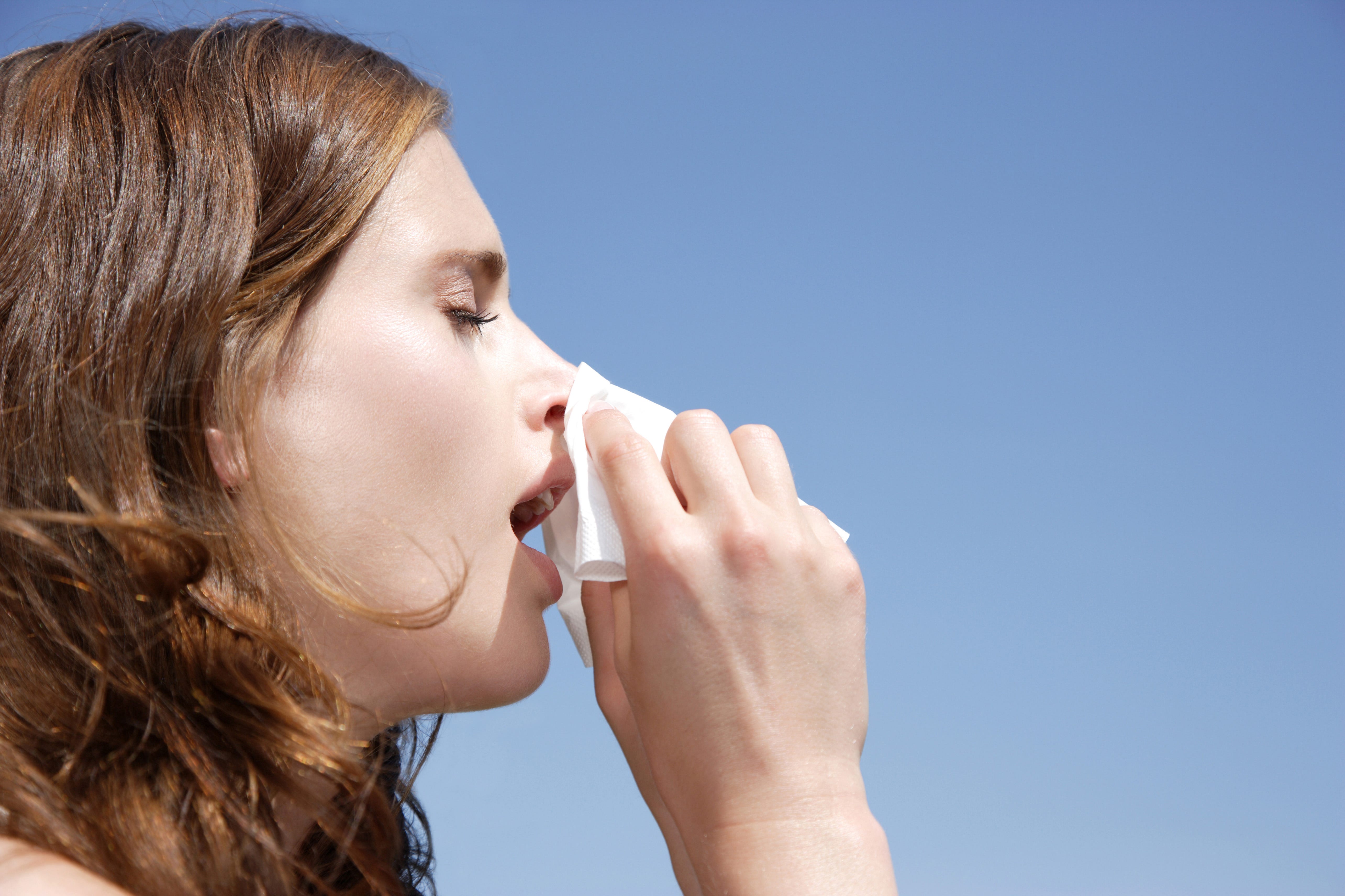 Sneezing woman