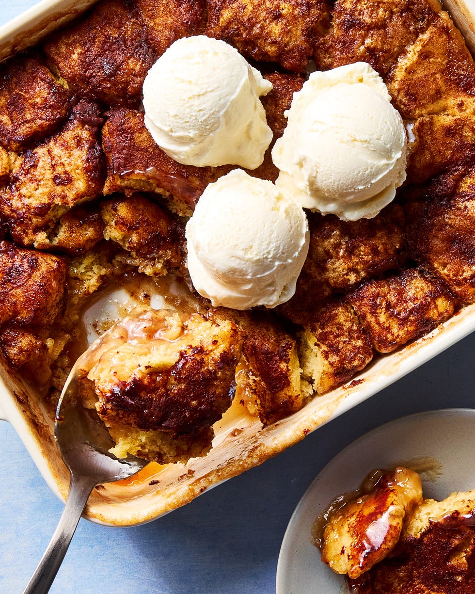 snickerdoodle mixture baked in a dish and topped with vanilla ice cream