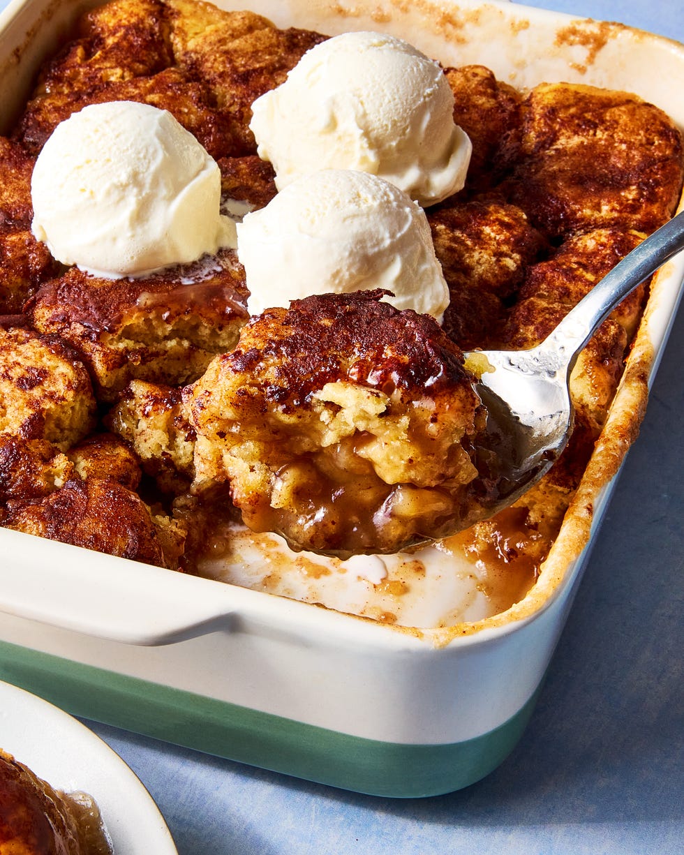 snickerdoodle mixture baked in a dish and topped with vanilla ice cream