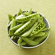 organic snap peas in a bowl